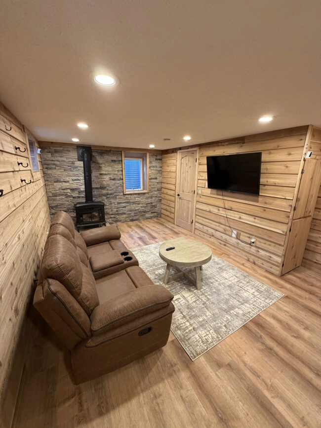 Cozy living room with a fireplace in a senior living home