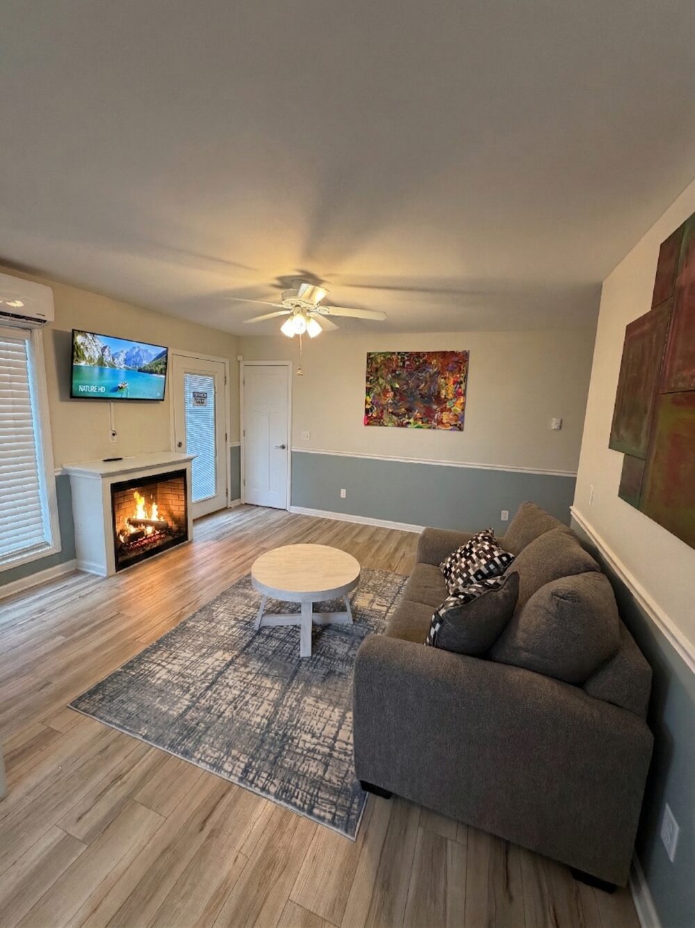 Open, sunlit living room in an assisted living home